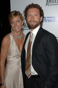 T.J. Thyne and Guest at the 21st Genesis Awards.