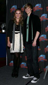 Emily Osment and Lucas Till at the promotion of "Hannah Montana."