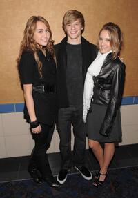 Miley Cyrus, Lucas Till and Emily Osment at the screening of "Hannah Montana."