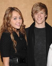 Miley Cyrus and Lucas Till at the screening of "Hannah Montana."