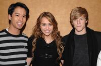 Jared Eng, Miley Cyrus and Lucas Till at the screening of "Hannah Montana."
