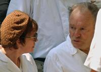 Jean-Louis Trintignant and director Nadine Trintignant at the funeral of their daughter a the Pere Lachaise cemetery.
