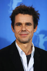 Tom Tykwer at the photocall of "The International" during the 59th Berlin Film Festival.