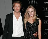 Johann Urb and Erin Urb at the premiere of "2012."