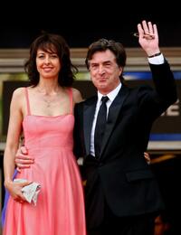 Valerie Bonneton and Francois Cluzet at the premiere of "In The Beginning" during the 62nd International Cannes Film Festival.