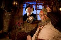 Tom Waits as Mr. Nick and Christopher Plummer as Dr. Parnassus in "The Imaginarium of Doctor Parnassus."