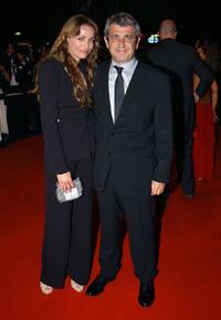 Michel Boujenah and his wife at the Palais des Festivals premiere of "Comme Une Image."
