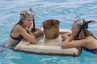 Malin Akerman as Ronnie and Kristen Bell as Cynthia in "Couples Retreat."