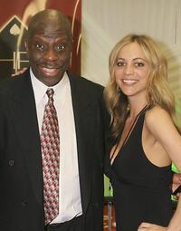 Jimmie "J.J." Walker and Guest at the HP, Hollywoodpoker.com display.