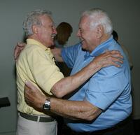 Ernest Borgnine and Warren Stevens at the California screening of "Trail to Hope Rose".