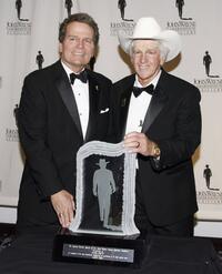 Patrick Wayne and Dean Smith at the John Wayne Cancer Institute Auxiliary's 21st Annual Odyssey Ball.