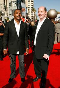 Carl Weathers and Guest at the 35th Anniversary of Gold's Gym.