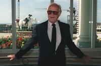 Richard Widmark poses on the balcony of the Deauville casino during the American Film Festival.
