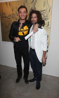 Ed Westwick and artist Todd DiCiurcio at the Todd DiCiurcio "Gold" Exhibition in London.