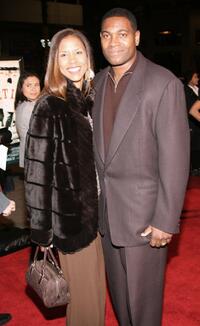Mykelti Williamson and Guest at the premiere of "ATL."