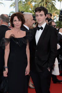 Elizabeth Bourgine and Jules at the premiere of "De Rouille et D'os" during the 65th Annual Cannes Film Festival.