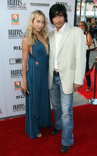 Billy Wirth and his guest at the premiere of "El Cantante."