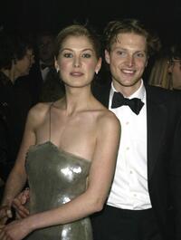 Rosamund Pike and Simon Woods at the after party of the world premiere of "Die Another Day."