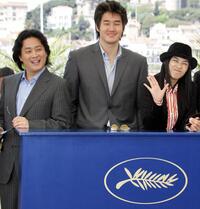 Park Chan Wook, Yoo Ji-Tae and Gang Hye Jung at the photocall of "Old Boy" during the 57th Cannes Film Festival.