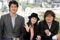 Yoo Ji-Tae, Gang Hye Jung and Choi Min Sik at the photocall of "Old Boy" during the 57th Cannes Film Festival.