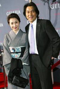 Koji Yakusho and guest at the premiere of "Memoirs of a Geisha."
