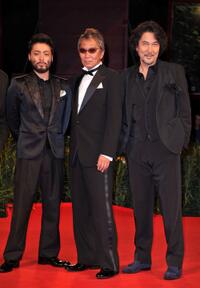 Takayuki Yamada, director Takashi Miike and Koji Yakusho at the premiere of "13 Assassins" during the 67th Venice Film Festival.