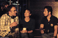 Director Danny Boyle, Michelle Yeoh and Hiroyuki Sanada on the set of "Sunshine."