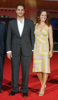 Raoul Bova and Chiara Giordano at the premiere of "5x2 (Cinq Fois Deux)" during the 61st Venice Film Festival.