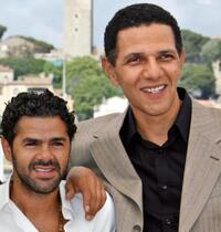 Jamel Debbouze and Roschdy Zem at the photocall of "Indigenes" during the 59th edition of the International Cannes Film Festival.