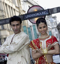 Arif Zakaria and Carol Furtado at the Piccadilly Circus to promote "The Merchants of Bollywood" dance show in England.