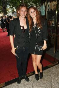 Jamie Campbell Bower and Guest at the European premiere of "Public Enemies."