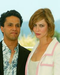 Sami Bouajila and Anna Mouglalis at the photocall of "En Jouant Dans La Compagnie Des Hommes" at Palais des Festivals during the 56th International Cannes Film Festival.