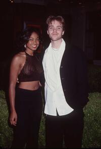Jonathan Brandis and Tatyana Ali at the premiere of "Independence Day."