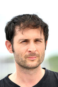 Arthur Harari at the "Onoda" photocall during the 74th annual Cannes Film Festival.
