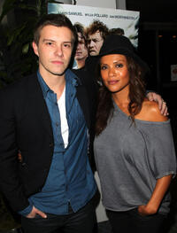 Xavier Samuel and Lesley Ann Brandt at the California premiere of "Drift."