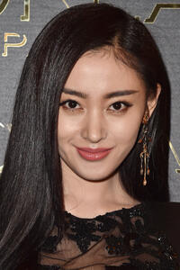Zhang Tianai at the Gold Obsession Party during Paris Fashion Week.