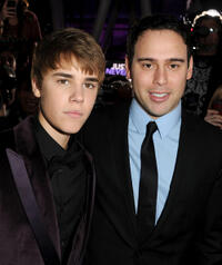 Singer Justin Bieber and Scooter Braun at the California premiere of "Justin Bieber: Never Say Never."