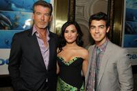 Pierce Brosnan, Demi Lovato and Joe Jonas at the premiere of "Oceans."