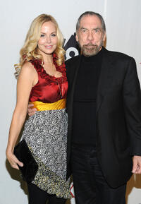 Eloise Broady and John Paul DeJoria at the Maxim Party Powered by Motorola Xoom in Texas.