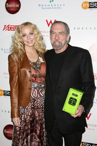 Eloise Broady and John Paul DeJoria at the Leeza Gibbons' Dare2Care Pre-Oscar Cocktail party in California.