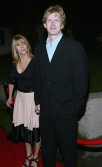 Bill Brochtrup and Guest at the NYPD season twelve wrap party.