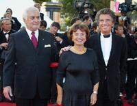 Jean-Claude Brialy, former culture minister Jack Lang and his wife Moniquee at the 56th Cannes film festival.