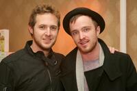 A.J. Buckley and Aaron Paul at the Belvedere Luxury Lounge in honor of the 80th Academy Awards.