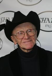 Red Buttons at the Share Inc's 52nd Annual Boomtown party.