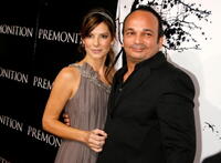 Sandra Bullock and director Mennan Yapo at the Hollywood premiere of "Premonition."
