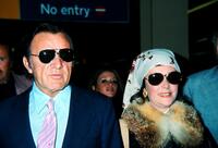 Richard Burton and Elizabeth Taylor in London, England for his 50th Birthday.