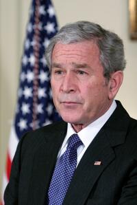 George W. Bush at the Billion Auto Industry Bailout Plan.