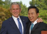 President George W. Bush and President Lee Myung-bak at the presidential Blue House in Seoul.
