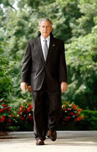 President George W. Bush at the Rose Garden Of The White House.