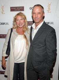 Robert John Burke and Guest at the Henri Bendel and YSL Beaute celebration of "Gossip Girl" Season 2.